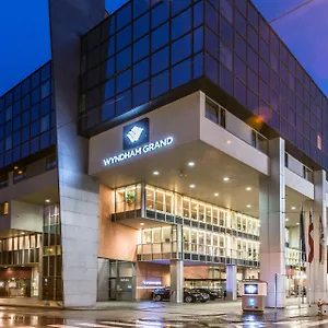 4* מלון Wyndham Grand Conference Centre